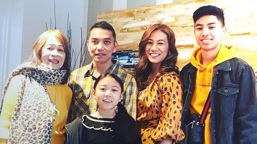 Michelle Macadangdang with her family