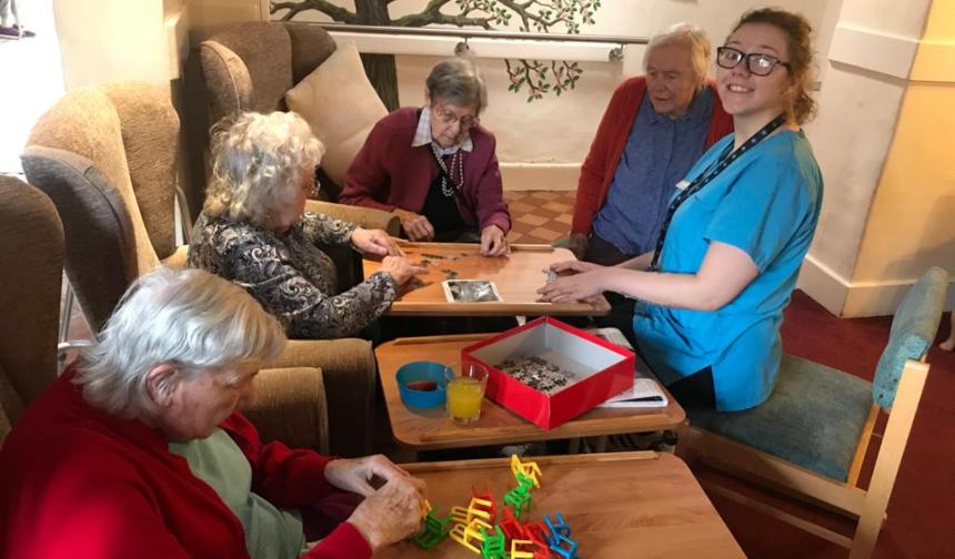 Ellie enjoying activities with care home residents