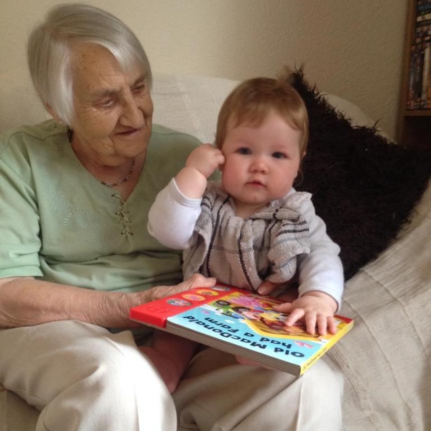 Dorothy with her great-grandchild on her lap, before coronavirus