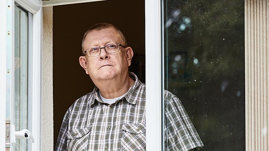 Pete Middleton looking out of a window. 