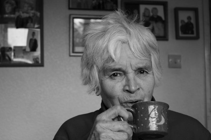 Kyra's grandma, Winifred, drinking a cup of hot chocolate
