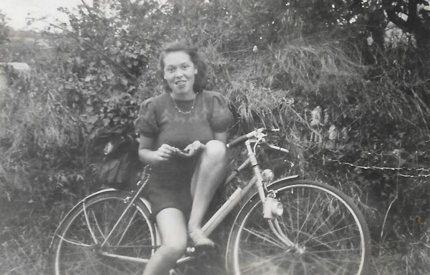 An old photograph of Ting Ting's granny, Marion, pictured sitting on her bicycle