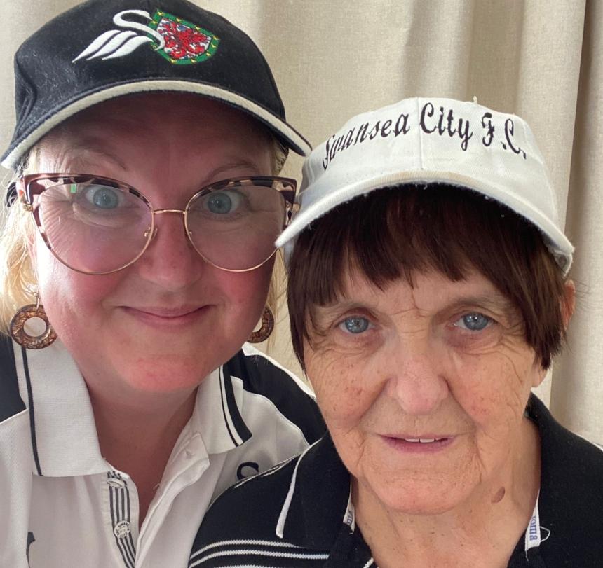 Joanna and her mum Sue in Swansea City F.C. hats