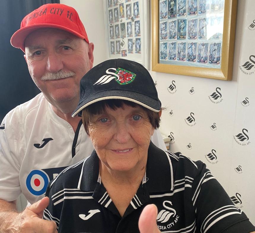 Sue with her husband, Gordon, in matching Swansea City hats