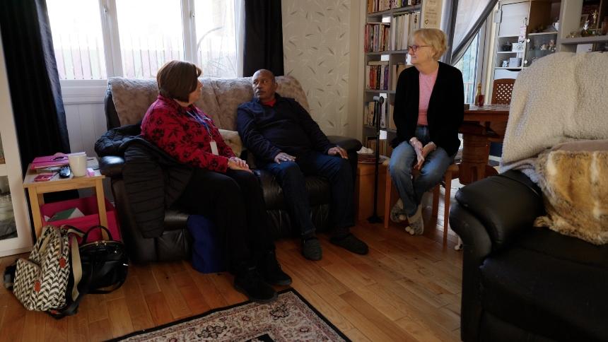 Ananga and Jo sit with Cathy, their Alzheimer's Society dementia support worker