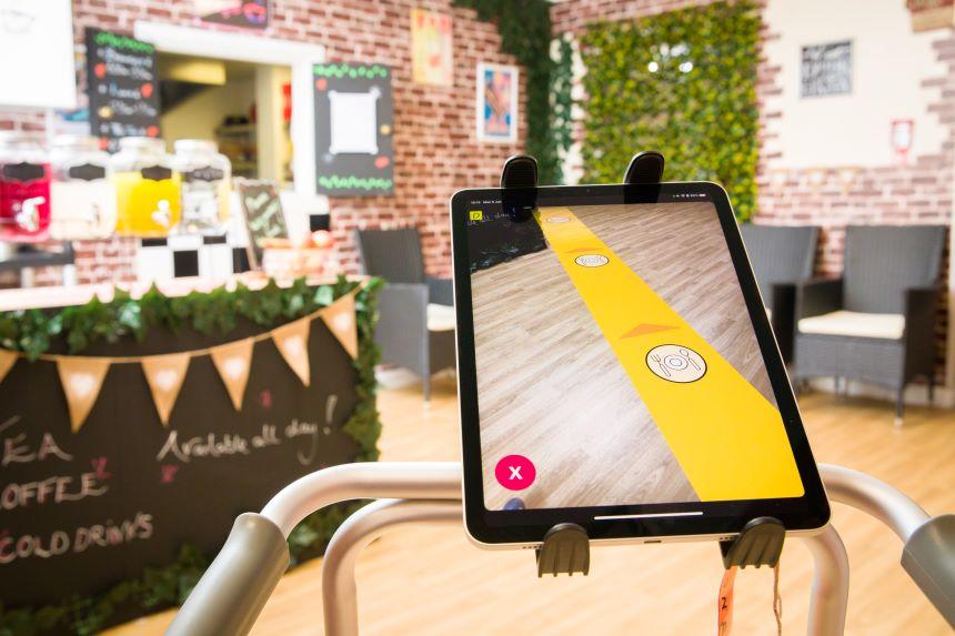 The Dorothy App prototype - a tablet attached to a walking frame