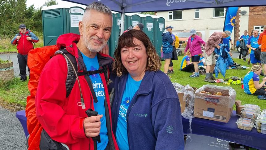 Caroline and her husband at a Trek26 event
