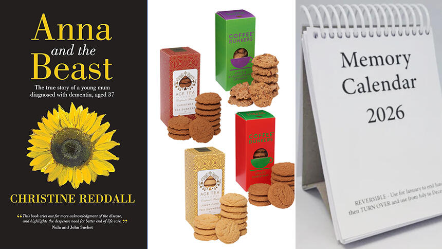 Anna and the Beast front cover, which is black with a sunflower on it, four packets of biscuits and a white calendar with black text