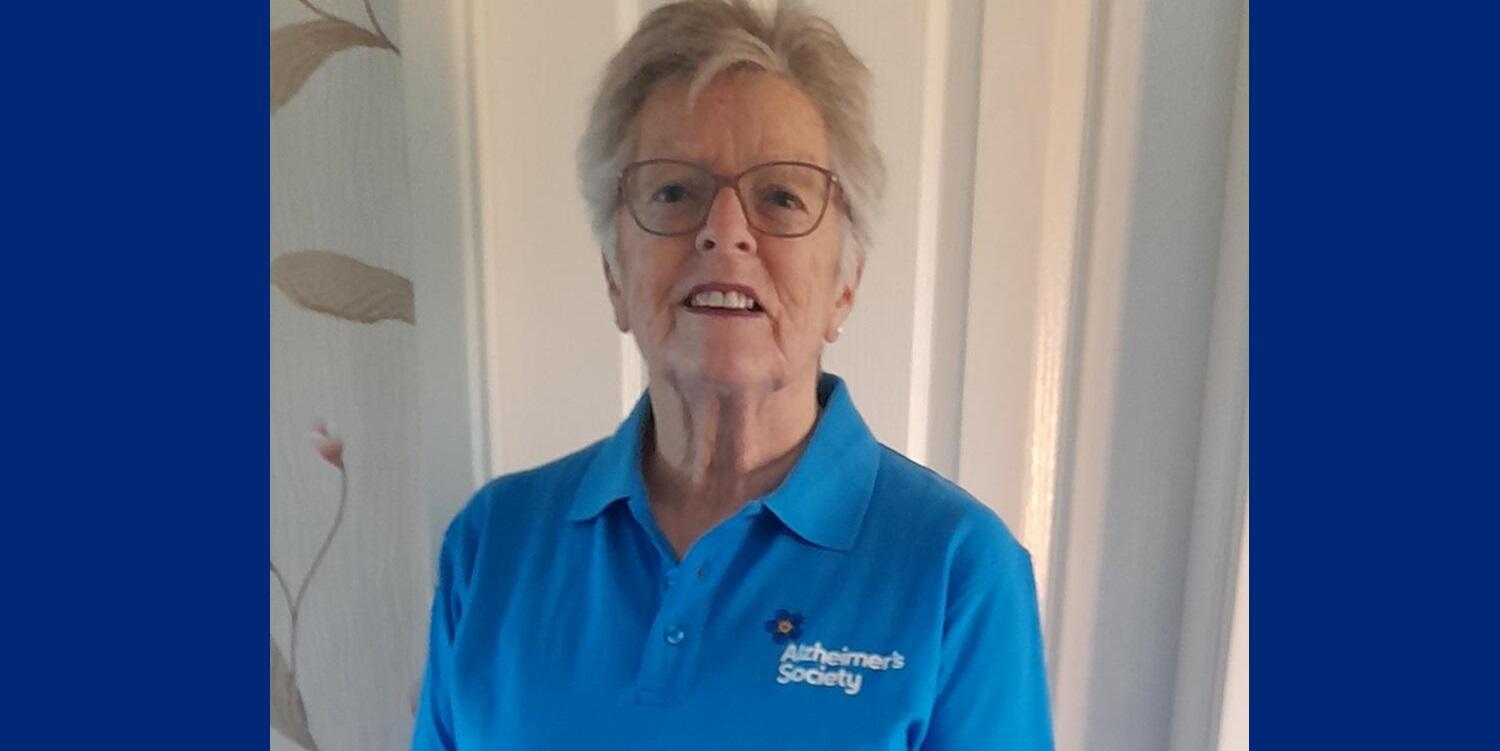 Heather Hooper, Dementia Volunteer in a blue Alzheimer's Society t-shirt