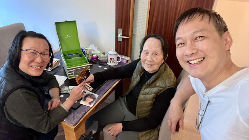 Steven Lai, his mother and a carer