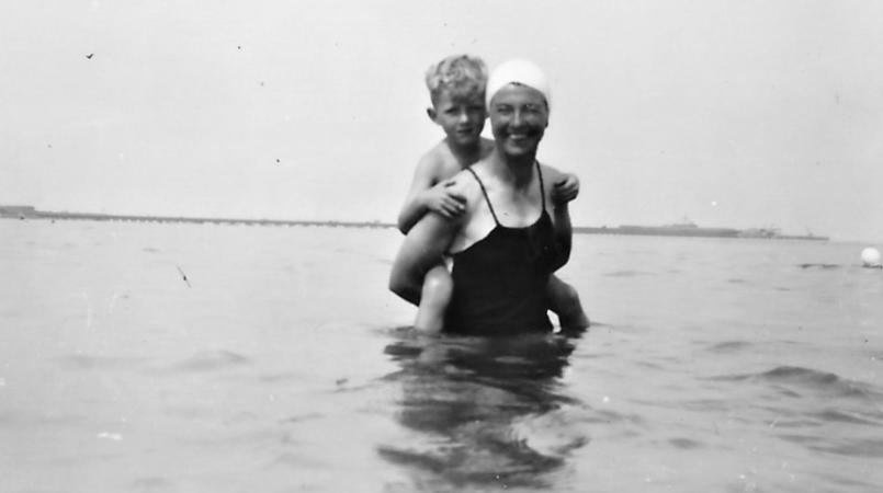 Tony Ward as a child with his mother in the water