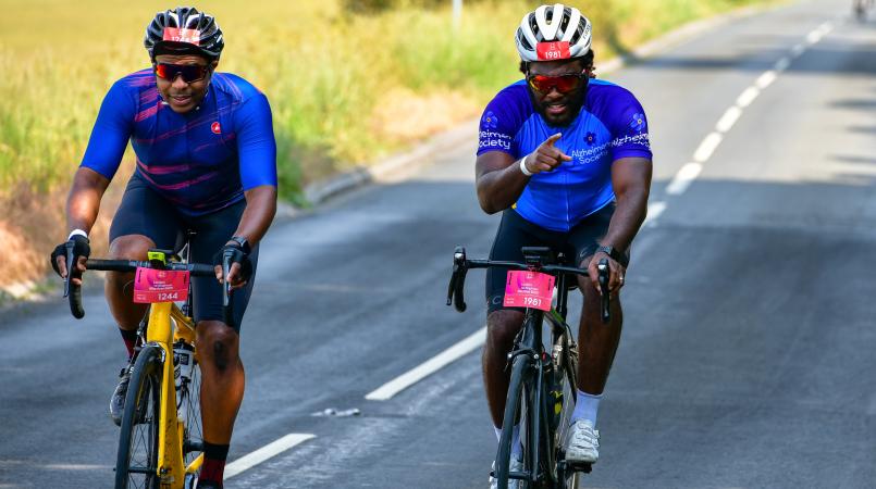 Two male cyclists in the countryside