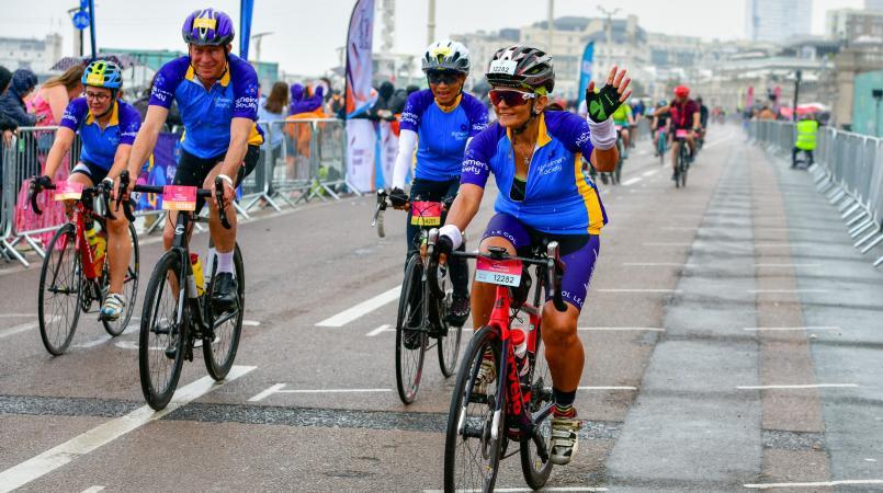 Group of London to Brighton finish cyclists