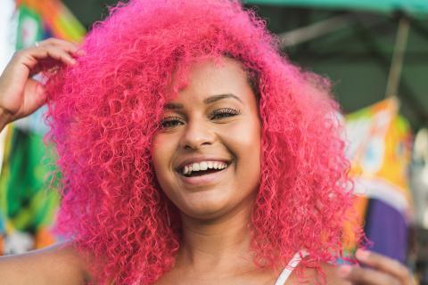 A woman with pink hair