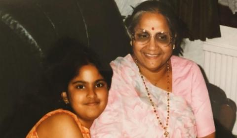 Meera with her grandmother in the 90s