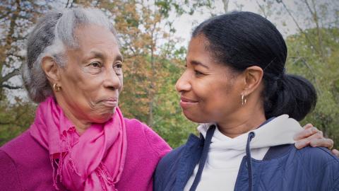 A close-up of Daphne with her arm around her daughter, Michelle