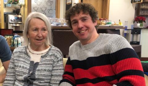 Sheila with Stephen smiling at the care home