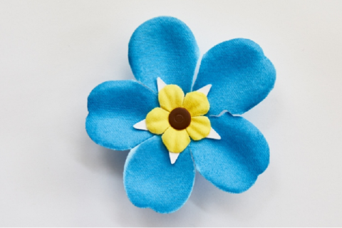 Forget me not flower badge