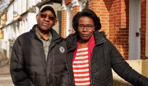 A couple walking around their local area