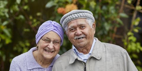 A close up of a woman and man smiling