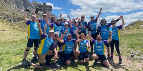 A group of hikers cheering