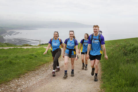 Group of people on a coastal trek