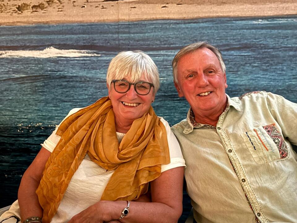 Adrienne pictured on holiday with a loved one