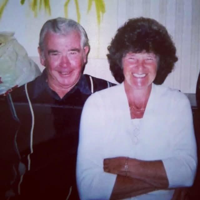 A smiling man and woman