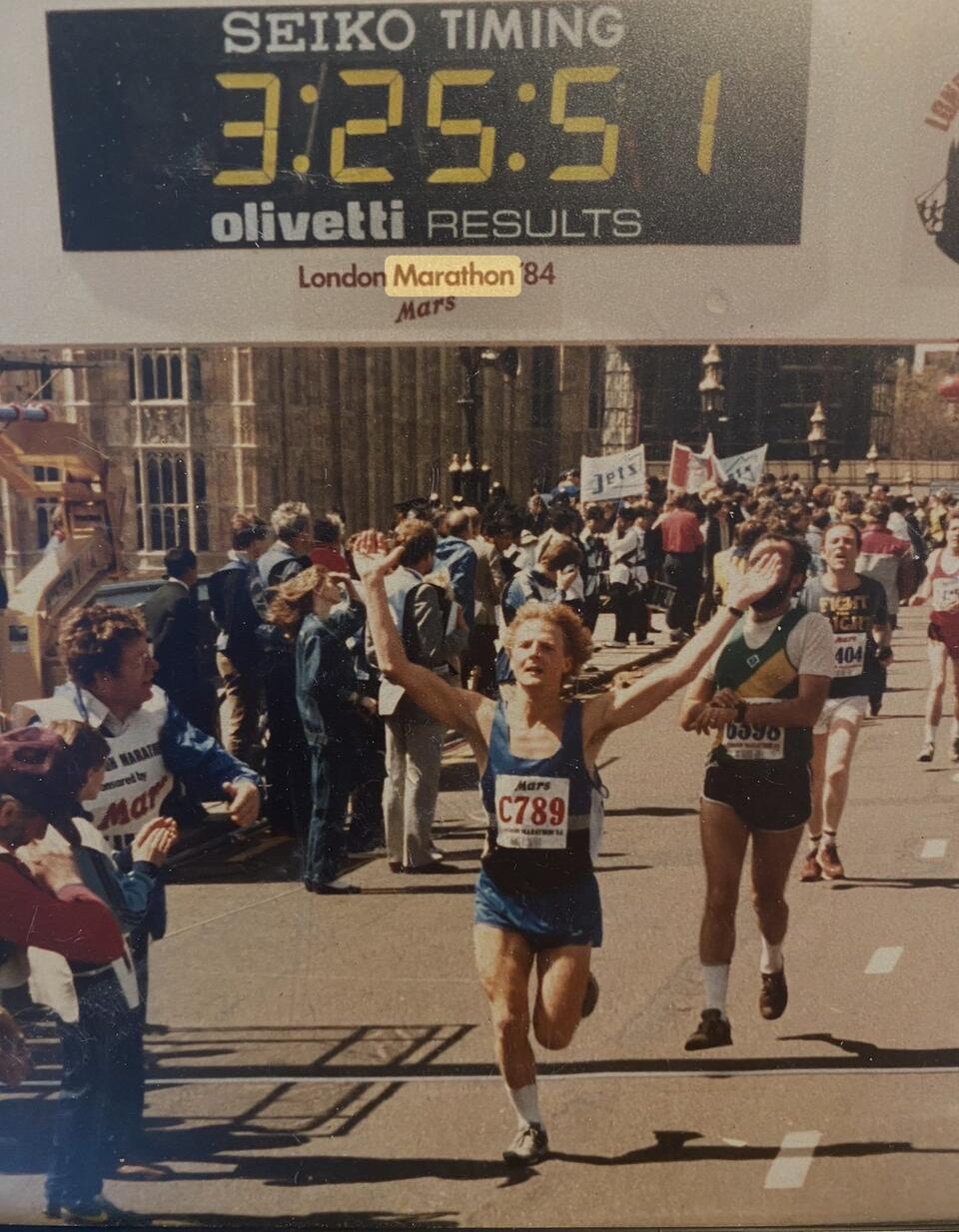 A film photo of London Marathon runners at the finish line