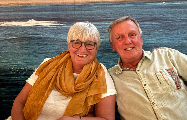 Adrienne pictured on holiday with a loved one