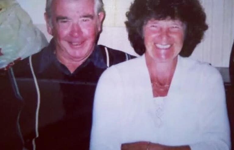A smiling man and woman