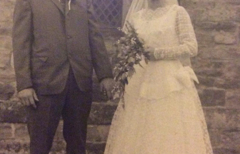 A sepia photo of a bride and groom